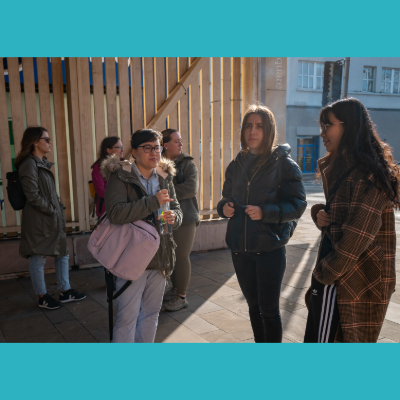 Group of people talking outside